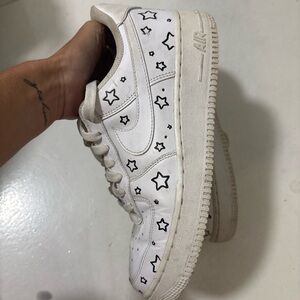 Nike White Sneakers with Black Star Accents